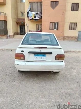 كيا برايد 2001 أبيض مستعملة للبيع
