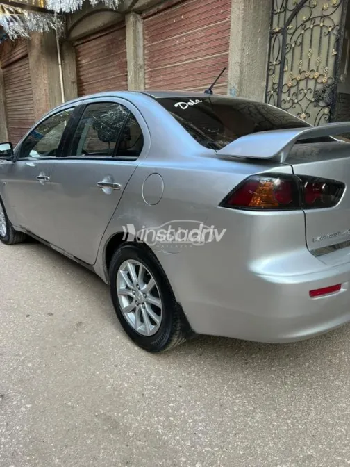 ميتسوبيشي لانسر اى اكس شارك 2016 فضي مستعملة للبيع - 4