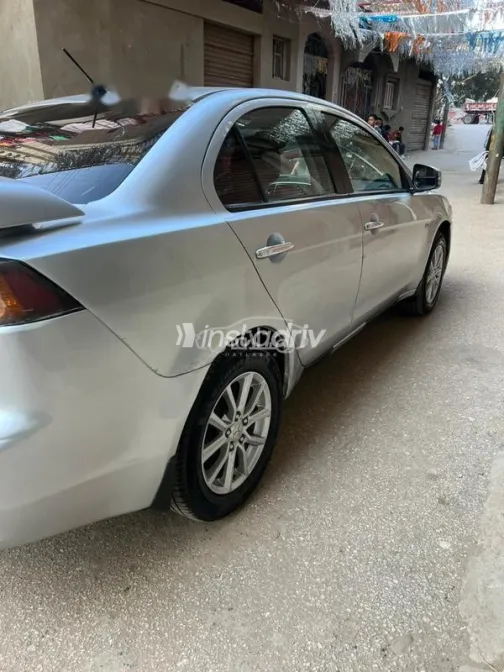 ميتسوبيشي لانسر اى اكس شارك 2016 فضي مستعملة للبيع - 5