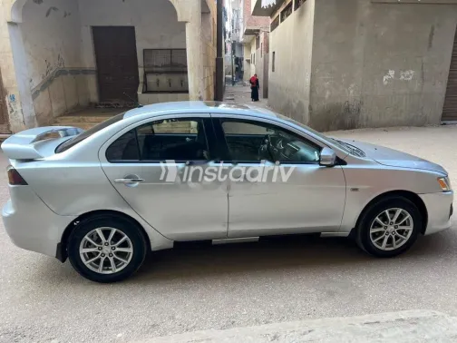 ميتسوبيشي لانسر اى اكس شارك 2016 فضي مستعملة للبيع - 8