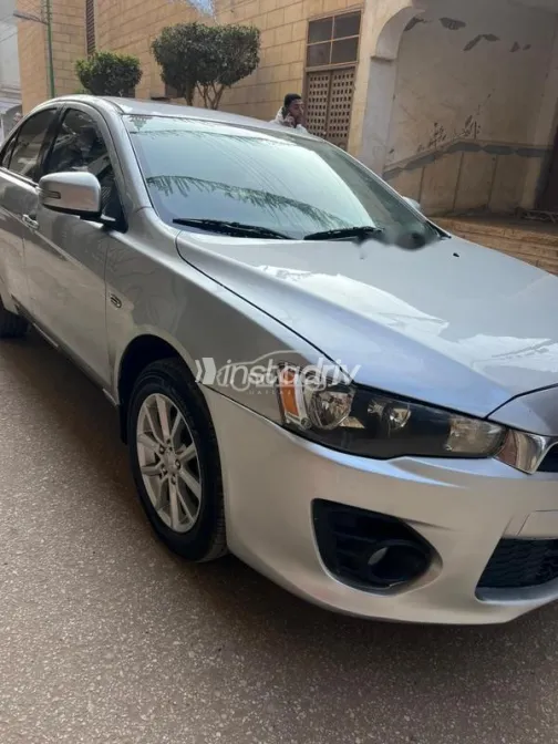 ميتسوبيشي لانسر اى اكس شارك 2016 فضي مستعملة للبيع - 9