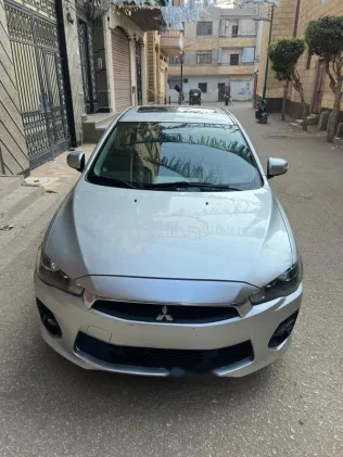 ميتسوبيشي لانسر اى اكس شارك 2016 فضي مستعملة للبيع