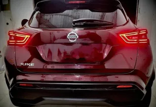 نيسان جوك 2022 أحمر غامق مستعملة للبيع