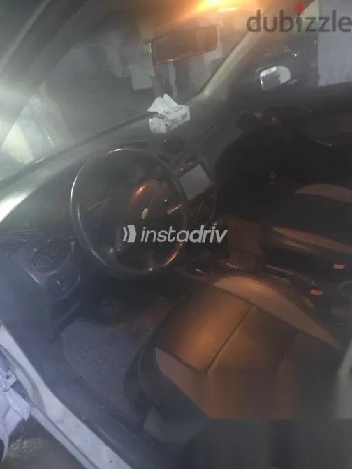 فورد فوكس 2003 أبيض مستعملة للبيع - 8