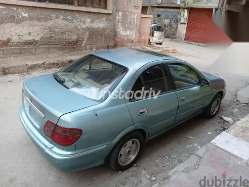 نيسان صنى 2002 أزرق غامق مستعملة للبيع - 6