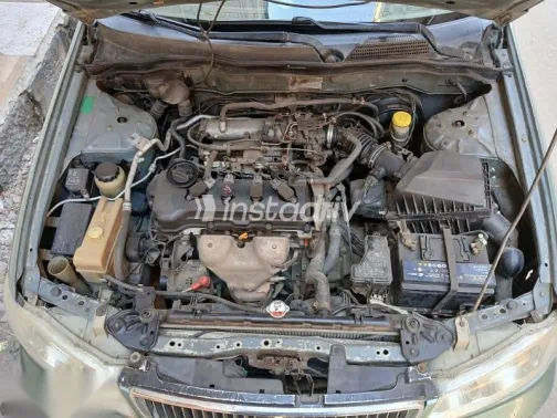 نيسان صنى 2002 أزرق غامق مستعملة للبيع - 7