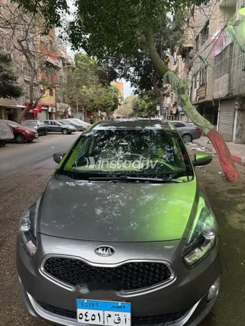 كيا كارينز 2015 ذهبي مستعملة للبيع - 8