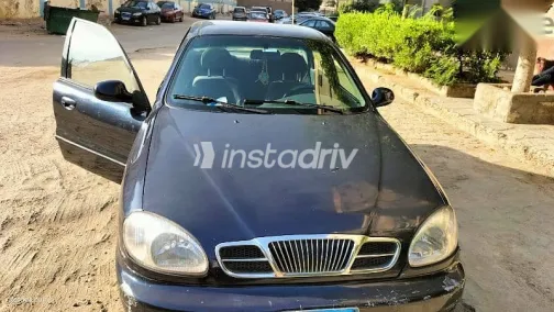 دايو لانوس 2008 أزرق غامق مستعملة للبيع - 1