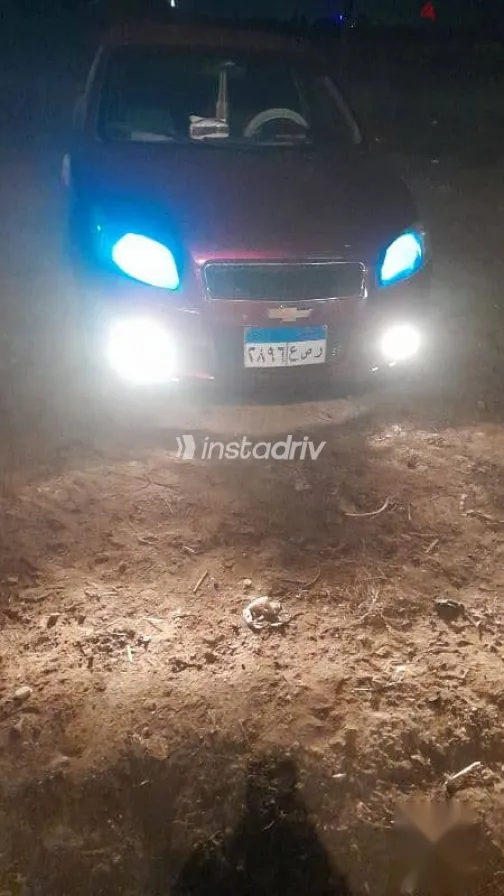 شيفروليه افيو 2015 أحمر مستعملة للبيع - 2