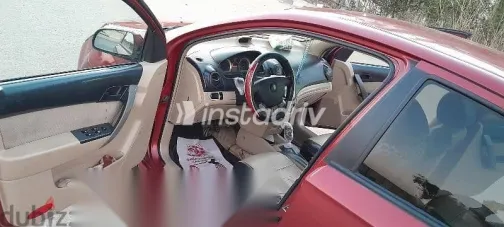 شيفروليه افيو 2015 أحمر مستعملة للبيع - 9