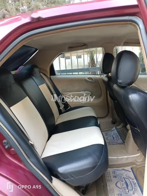 هوندا سيتى 2005 أحمر غامق مستعملة للبيع - 5