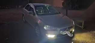ميتسوبيشي لانسر 2015 رمادي مستعملة للبيع