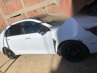 جيلي امجراند 2013 أبيض مستعملة للبيع