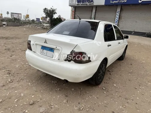 ميتسوبيشي لانسر بومة 2014 أبيض مستعملة للبيع - 3