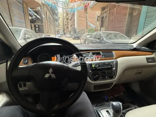 ميتسوبيشي لانسر بومة 2014 أبيض مستعملة للبيع - 5
