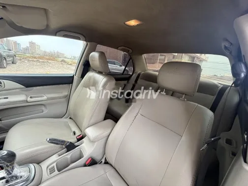 ميتسوبيشي لانسر بومة 2014 أبيض مستعملة للبيع - 8