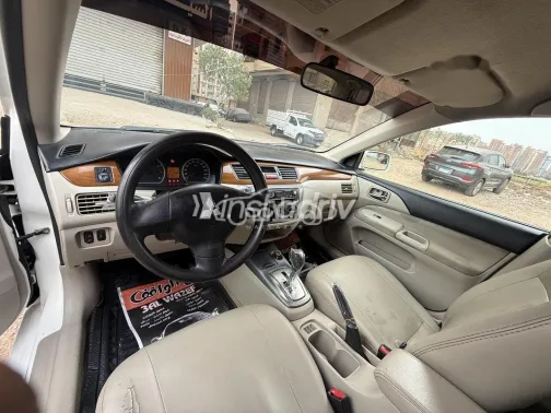 ميتسوبيشي لانسر بومة 2014 أبيض مستعملة للبيع - 9