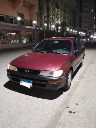 تويوتا كورولا 1994 أبيض مستعملة للبيع
