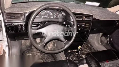 اوبل فيكترا 1995 أبيض مستعملة للبيع - 10