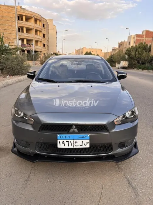 ميتسوبيشي لانسر اى اكس شارك 2016 رمادي مستعملة للبيع - 1