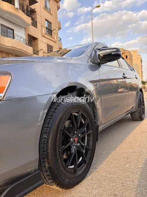 ميتسوبيشي لانسر اى اكس شارك 2016 رمادي مستعملة للبيع - 7