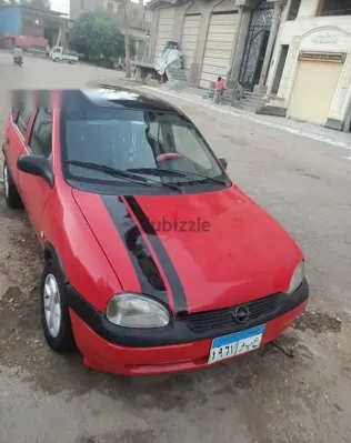 اوبل كورسا 1998 أحمر مستعملة للبيع