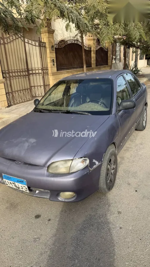 هيونداي اكسنت 1999 فضي مستعملة للبيع - 3