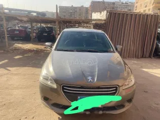 بيجو 301 2014 ذهبي مستعملة للبيع