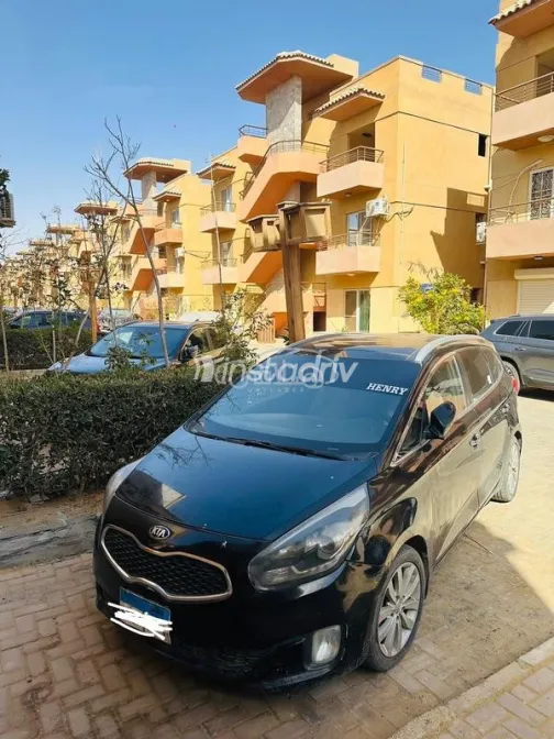 Kia Carens 2015 Black Used for Sale - 1