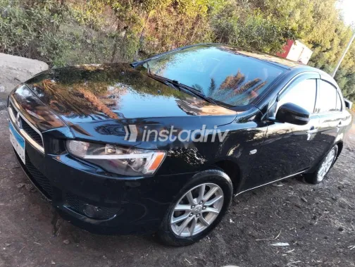 ميتسوبيشي لانسر اى اكس شارك 2015 أسود مستعملة للبيع - 1