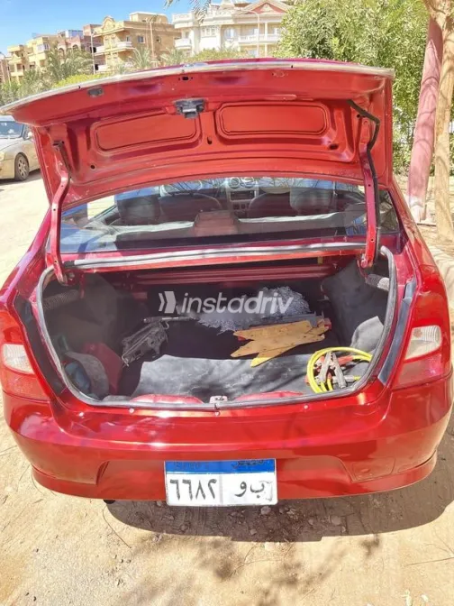 رينو لوجان 2013 أحمر غامق مستعملة للبيع - 7