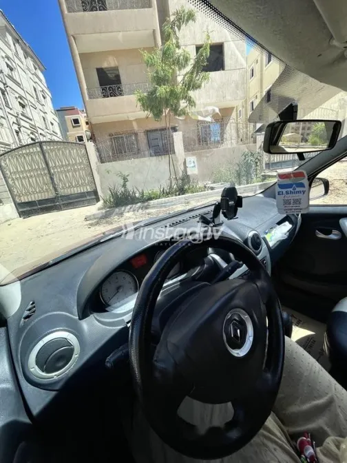 رينو لوجان 2013 أحمر غامق مستعملة للبيع - 9