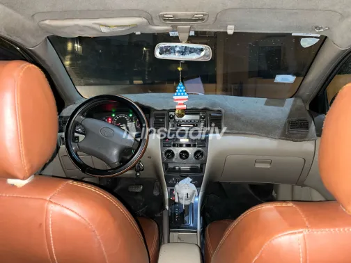 تويوتا كورولا 2004 أبيض مستعملة للبيع - 1