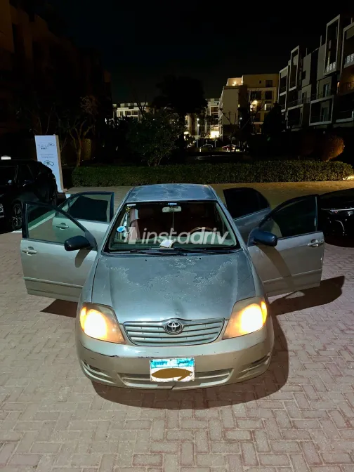 تويوتا كورولا 2004 أبيض مستعملة للبيع - 5