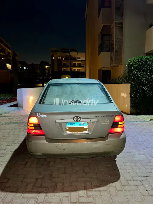 تويوتا كورولا 2004 أبيض مستعملة للبيع - 7