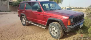 جيب شيروكي 1994 أحمر مستعملة للبيع