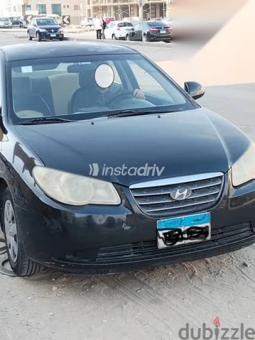 هيونداي إلنترا 2010 أسود مستعملة للبيع - 1