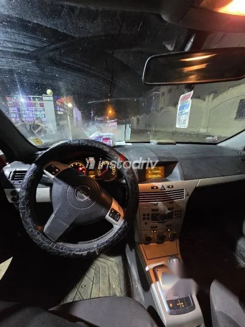 اوبل أسترا 2008 أحمر مستعملة للبيع - 4