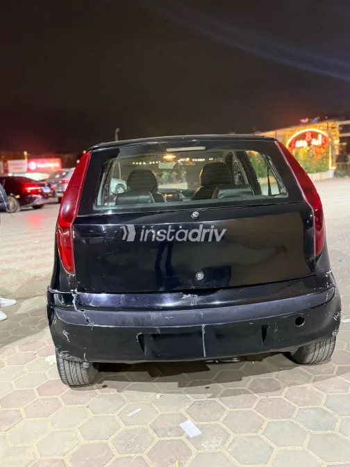 فيات بونتو 2002 أبيض مستعملة للبيع - 6