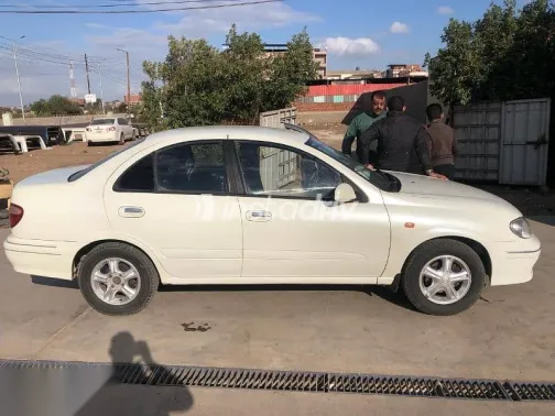 نيسان صنى 2003 أبيض مستعملة للبيع - 2