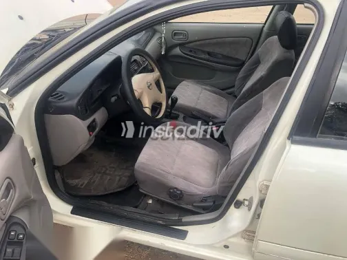 نيسان صنى 2003 أبيض مستعملة للبيع - 6