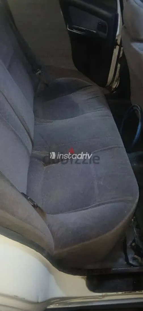 نيسان صنى 2000 أبيض مستعملة للبيع - 9