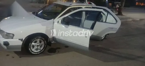 نيسان صنى 2000 أبيض مستعملة للبيع - 10