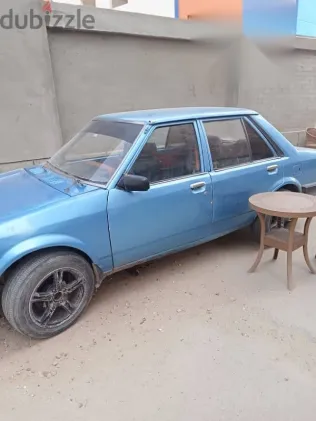 مازدا 323 1982 أزرق غامق مستعملة للبيع