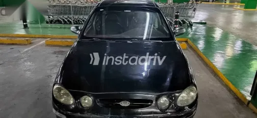 كيا شوما 2000 أسود مستعملة للبيع - 1