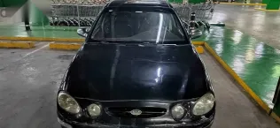 كيا شوما 2000 أسود مستعملة للبيع