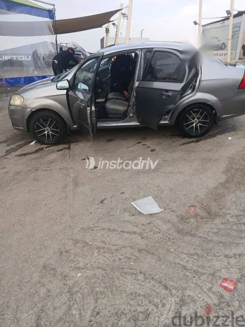 شيفروليه افيو 2013 رمادي مستعملة للبيع - 1