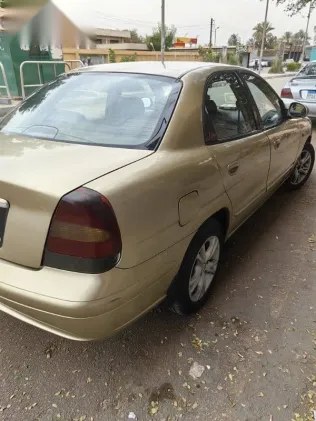 دايو نوبيرا 2002 ذهبي مستعملة للبيع