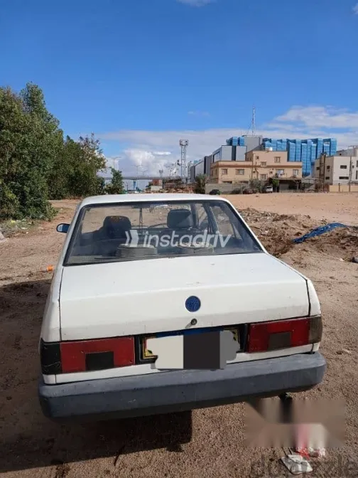 فيات شاهين 2001 أبيض مستعملة للبيع - 6