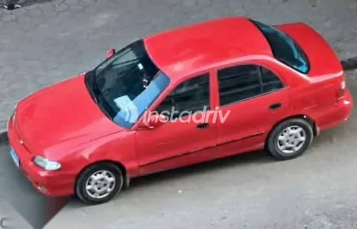 هيونداي اكسنت 2005 أحمر مستعملة للبيع - 2